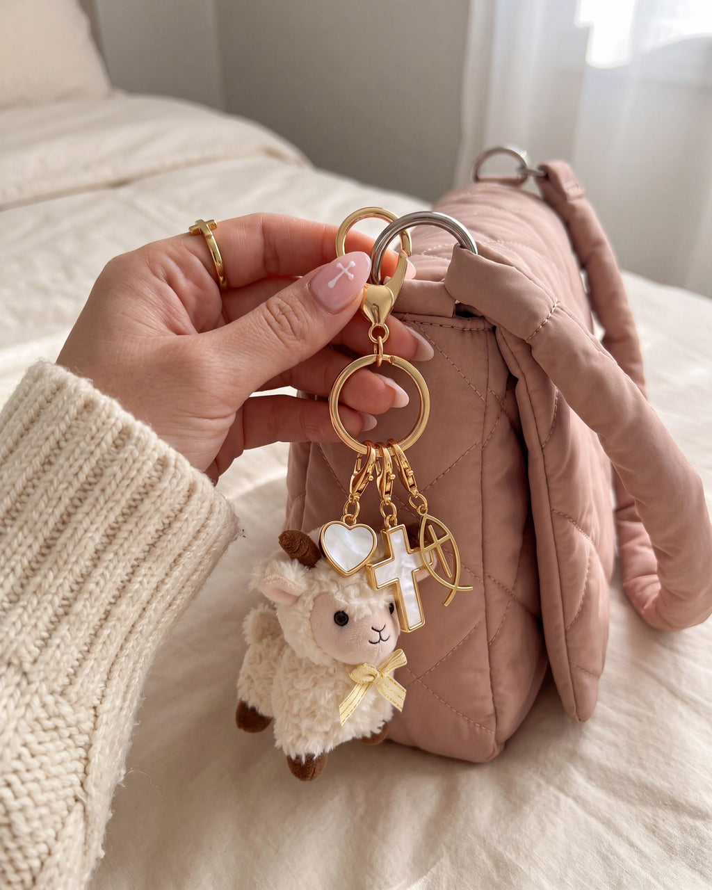 Clipping the charm set onto a bag strap