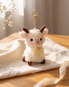 The plush lamb charm on its own