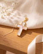 The pearl cross charm on its own